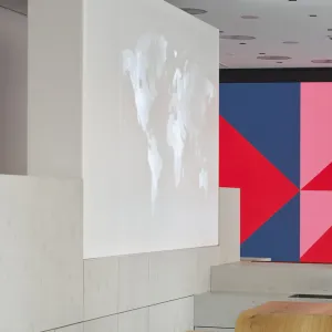 Illuminated world map that also serves as a room divider