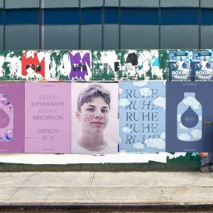 Series of different posters showing pink and blue RUH bottles and design elements such as the clouds and pink jelly-like circles