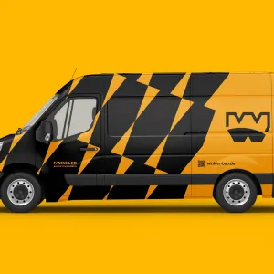 A van in the distinctive bright yellow and black Winkler design, prominently featuring the new geometric pattern and the logo