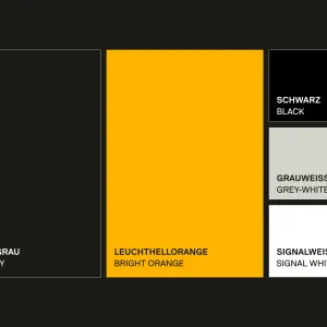 A high-contrast color palette of orange, black, and white that improves visibility on construction sites and clearly distinguishes the brand