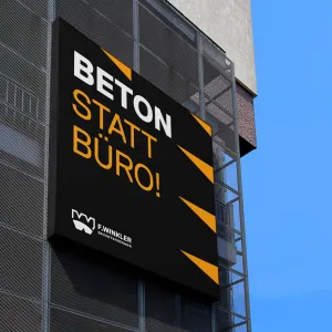 A large-format poster featuring clean typography and high contrast that conveys the message “Concrete Instead of an Office”